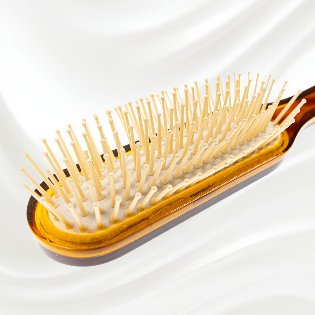 THE ULTIMATE DETANGLING HAIR BRUSH